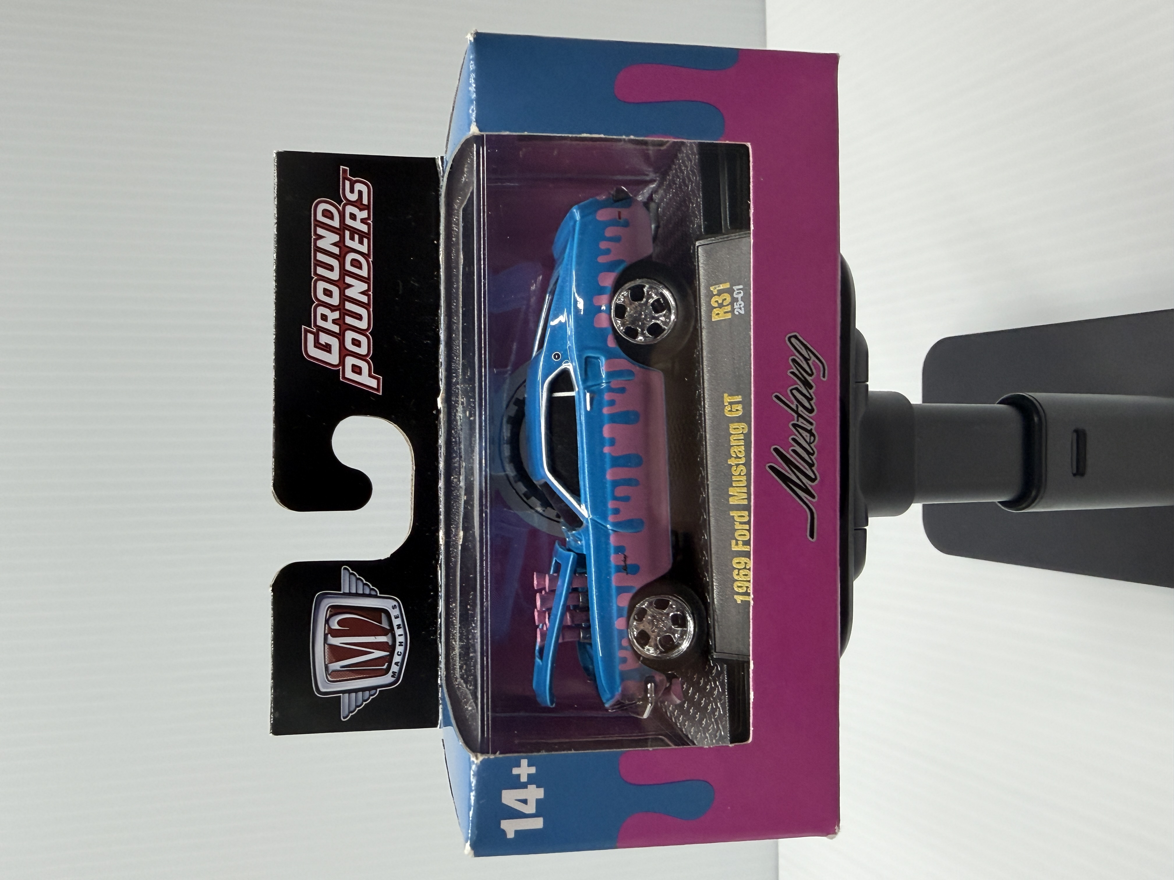 M2 Machines 1969 Ford Mustang GT — Blue/pink drip livery